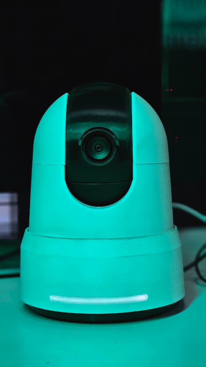 PTZ camera prototype under teal lab lighting